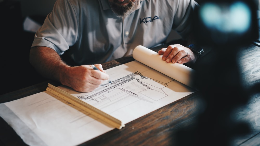 An engineer working on a construction plan.