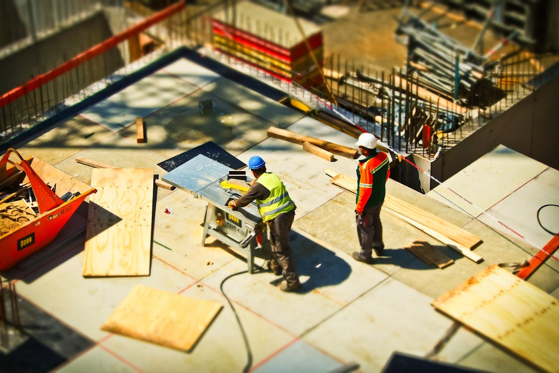 An image of people working on a construction site   