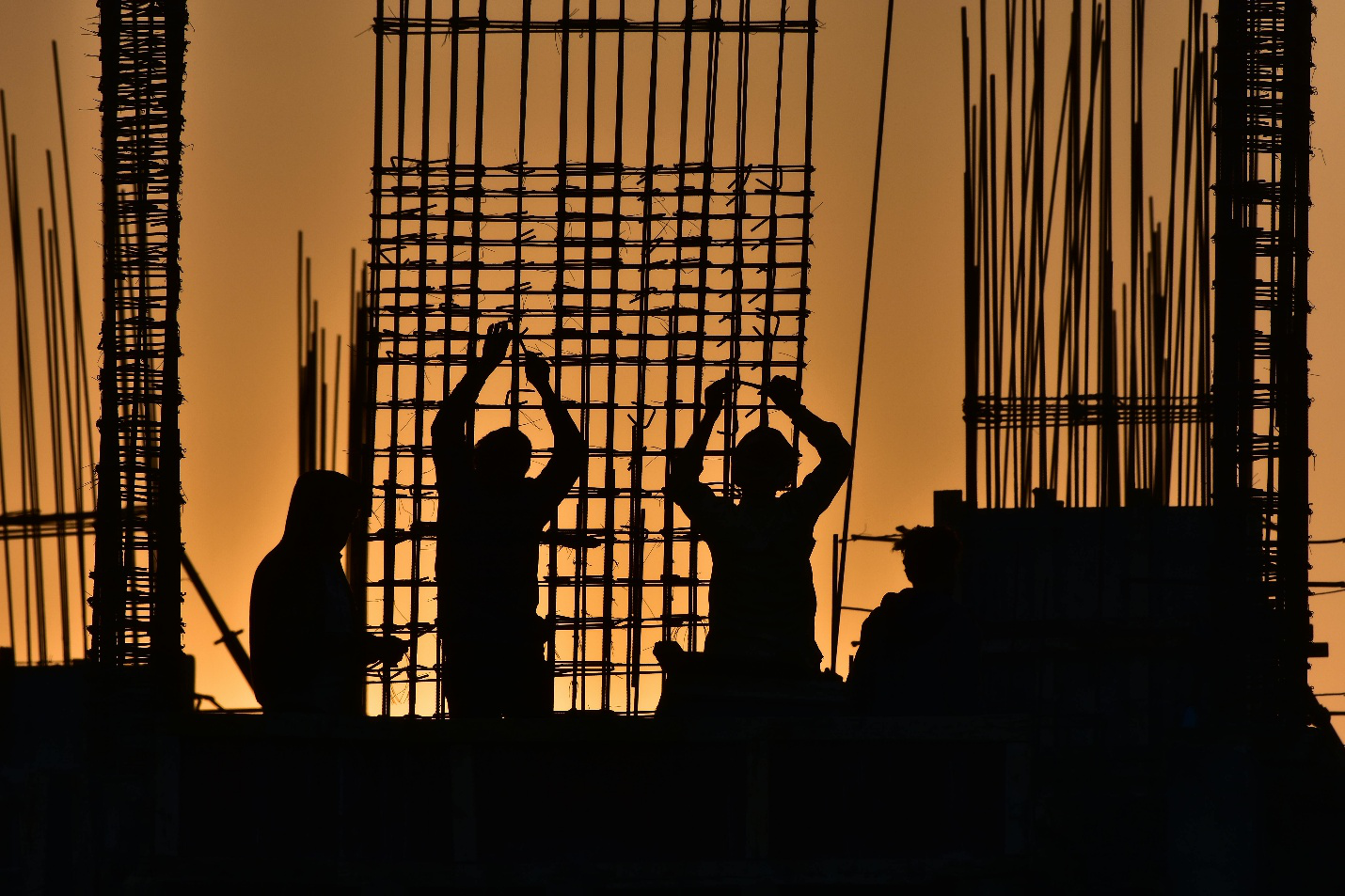 Silhouette of construction workers