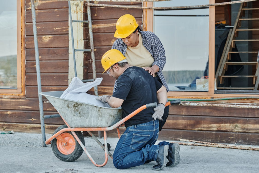 An image of construction workers working on a site